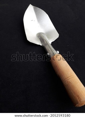 Close up photo of mini shovel for gardening