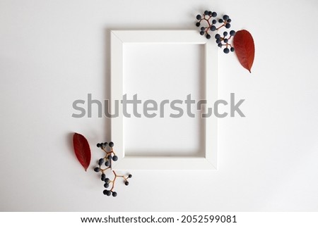 Autumn leaves placed corner of frame on white background, space for text or message, concept idea for fall, autumn or Thanksgiving, top view