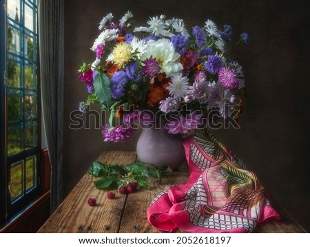 Still life with a bouquet of flowers in the room