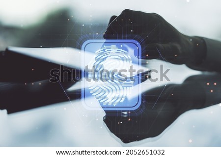 Multi exposure of abstract graphic fingerprint sketch and hand working with a digital tablet on background, fingerprint scan data concept
