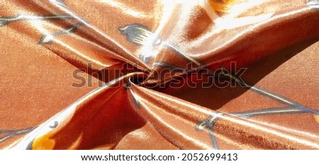 brown silk fabric with floral print, photo taken in bright light, texture background, pattern