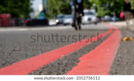 Double Red lines on a busy road in London