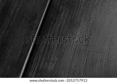 Black wooden table detail. Background or texture. Wooden table texture to add your text. Rustic textures concept to add your design