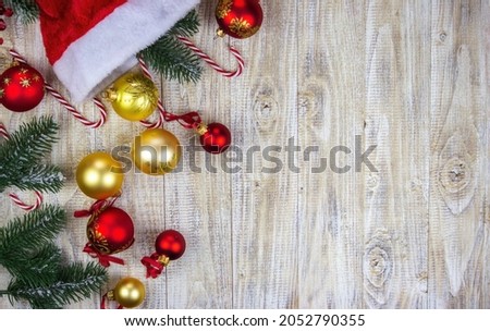 New Year's toys gifts, Christmas tree with decoration on a wooden board, New Years concept. Selective focus