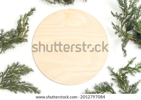 Blank empty round wood sign on white background with christmas blanket, christmas tree branch, rustic wood sign christmas mockup