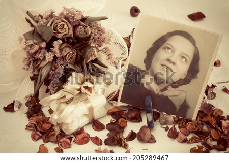atmosphere with dried flowers vintage antique photograph - instagram effect - filtered image