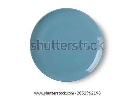 Empty ceramic plate . Pastel blue plate isolated on white background.