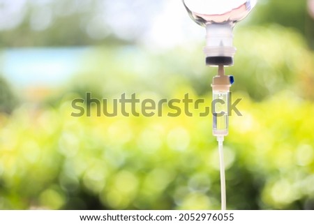 Natural vitamin iv drip set.concept saline intravenous drop supplement therapy infusion in hospital.selective.focus.  Royalty-Free Stock Photo #2052976055