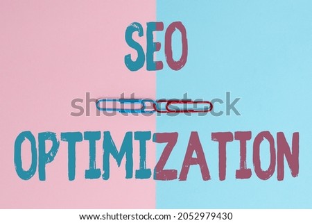 Text caption presenting Seo Optimization. Conceptual photo increasing visibility of a website or a web page to users Two Objects Arranged Facing Inward Outward On a Separated Coloured Background