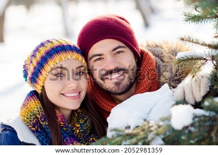 Photo of young cheerful couple happy positive toothy smile forest woods winter snow vacation holiday romantic