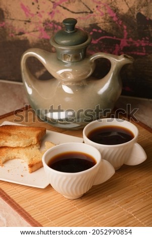 Breakfast for energy. Cup of coffee and toast. Vigor and energy in a sip of caffeine. Morning exercise. Cup of coffee in bed. Ground brewed coffee. Delicious drink.