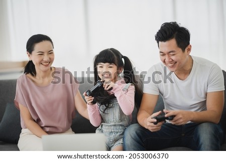 daughter children with mother and father are happy at home family together, lifestyle of Asian young girl with smile face are fun in a house with mom and dad