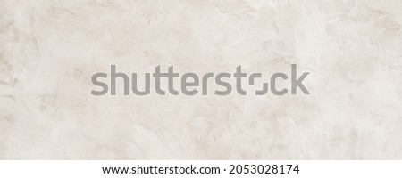 Warm white or beige rough grainy stone texture background