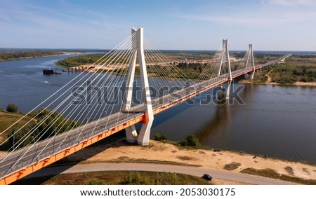 Aerial view of Murom cable bridge through Oka river, length of bridge about 1400 meters. Russia Royalty-Free Stock Photo #2053030175