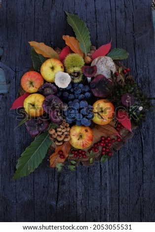 Thanksgiving image, autumn fruits, apples, grapes, chestnuts, leaves, mushrooms