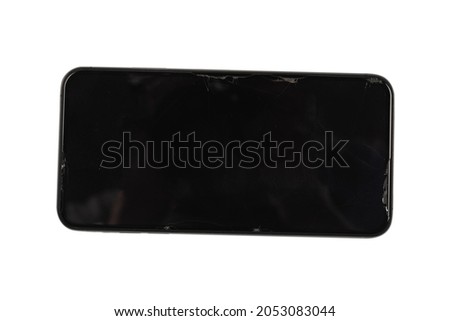 Smart phone with broken screen. isolated on a white background. Top view. 