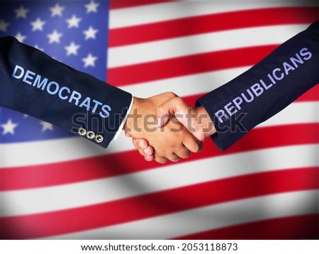 Political Parties Joining Hands with United States Flag in the background. Handshake between opposing parties of America
