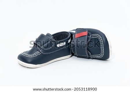 children's classic blue leather shoes. white background online product