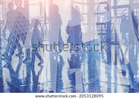 double exposure of crowd of people walking in modern building