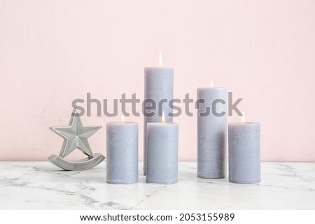 Beautiful aroma candles on table