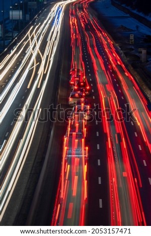 Long exposure - tracks of car headlights on the road