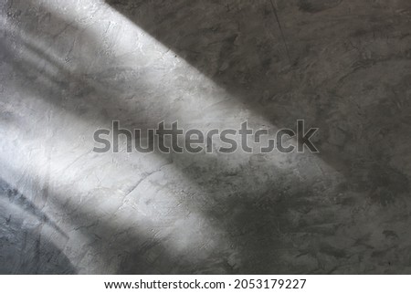 sunlight shadow Gray and black polished plaster walls