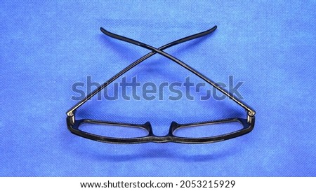 glasses on a blue background