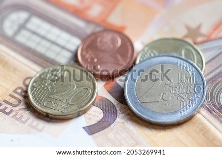 euro coins on euro banknotes background, photo of euro coins close up or macro