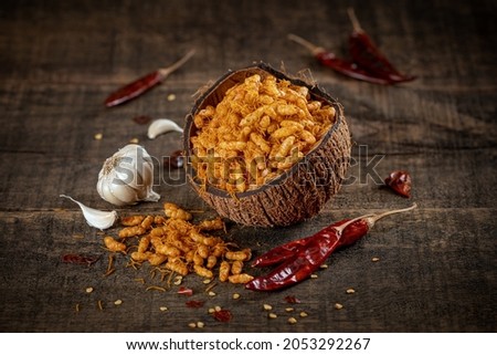 Garlic Sev Mamra is an Indian snack. garlic spices sev mamra, It is a mixture of spicy dry ingredients such as puffed rice, indian, snacks,
muri, puffed rice, garlic, red chilly
serve in coconut bowl. Royalty-Free Stock Photo #2053292267