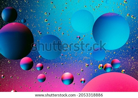 Abstract colorful background of oil circles. Oil in the water surface circles, water foam and oil bubbles. High quality photo