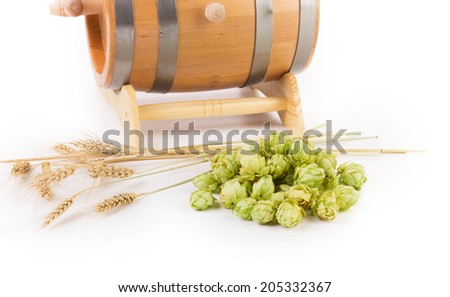 Barrel with hops . Isolated on a white background.