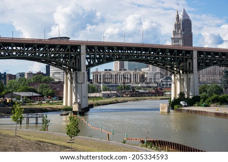 The Hope Memorial Bridge that spans the Cuyahoga River with a portion of the downtown Cleveland business district in the background seen from the Scranton Flats Towpath recreation area