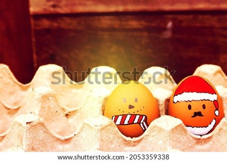 Easter eggs with santa face and snowman.