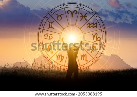 Zodiac signs inside of horoscope circle astrology and horoscopes concept Royalty-Free Stock Photo #2053388195