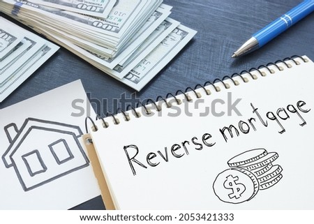 Reverse mortgage is shown on a business photo using the text