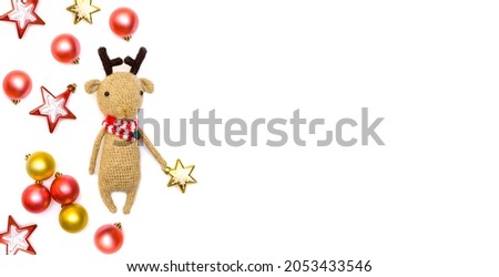Reindeer Christmas decor toys balls stars Free for text Poster Banner. Flat lay Christmas new year	
