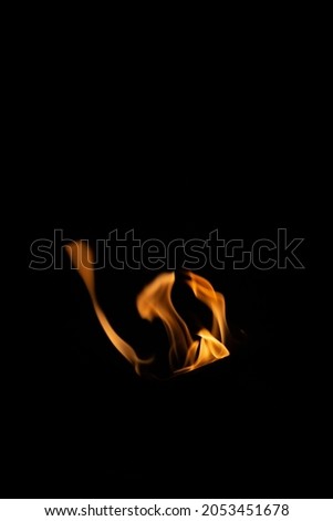 Beautiful Small Dancing flames on black background  