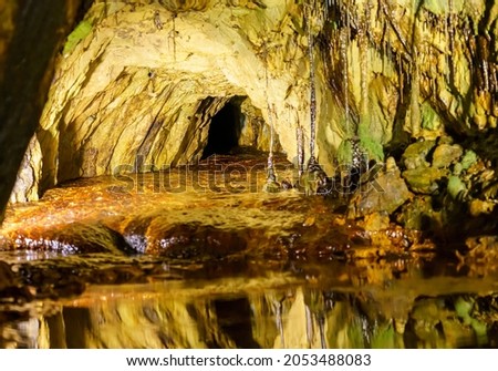 stalagmote and stalactite scene from inside Sygun Copper Mine, a restored Victorian copper mine in Snowdonia National Park, Wales UK