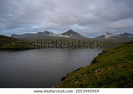 Beautiful aerial view of rock formation  Risin and Kellingin, the Giant and the Witch view from Tjornuvik in the Faroe Island