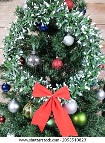 Christmas wreath on a Christmas tree.