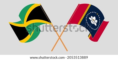 Crossed and waving flags of Jamaica and the State of Mississippi