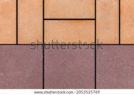 Brown granite tiled wall with vintage pattern texture and background seamless