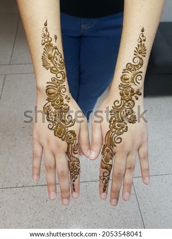 Mehndi design on the hand