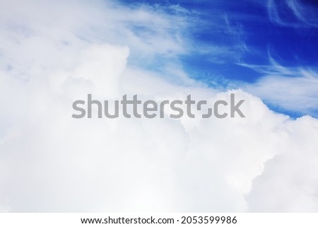 White cumulus clouds blue sky background closeup beautiful aerial cloudscape backdrop, cloudy skies from above, sunny heaven fluffy cloud texture, airplane flight cloudiness landscape view, copy space