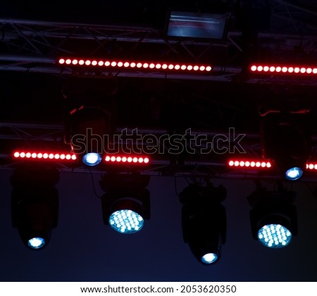 Spotlights at a concert at night. Background