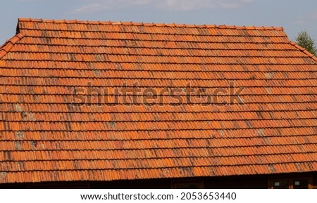 roof tile. tile roof of a old house. tile roofs used in old and modern style construction for safety and also it keeps house cool inside.