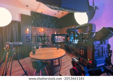 Podcast studio with soundproofing for youtube channels starting to make podcasts for most popular videos. Podcast media studio for broadcasting audio. Podcasting microphone speech or interview.