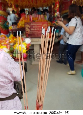 Burning incense to worship Buddha images is a belief in Buddhism in Thailand.