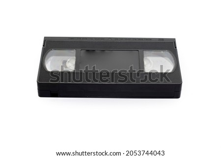 A VHS video cassette with logostrademarks removed. Isolated on white background.Retro concept.
