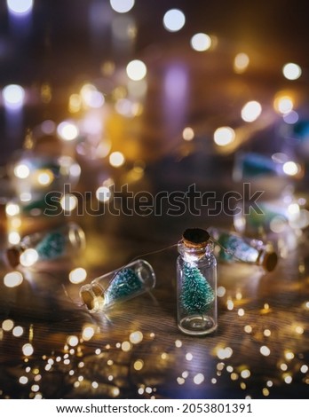  Merry Christmas and happy new year concept, Close up, Elegant Christmas tree in glass jar decoration. 
